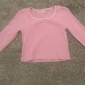 Light pink, long sleeve crop top. Been worn one time.